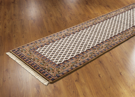 Teppiche - Brücke und Teppiche aus 100% Schurwolle – Farbe CAMELGRUNDIG – Ansicht  Teppiche - Brücke und Teppiche aus 100% Schurwolle, in Größe 037 (Brücke, ca. 70x140 cm) bis 309 (Teppich, ca. ø 200 cm), in Farbe CAMELGRUNDIG – Farbe CAMELGRUNDIG – Ansicht
