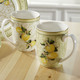 Geschirr - Hochwertige Fine-Bone-China-Porzellan-Serie, in Farbe WEISS-GELB, in Ausführung Henkelbecher, 2er-Set – Farbe WEISS-GELB – Ansicht 1