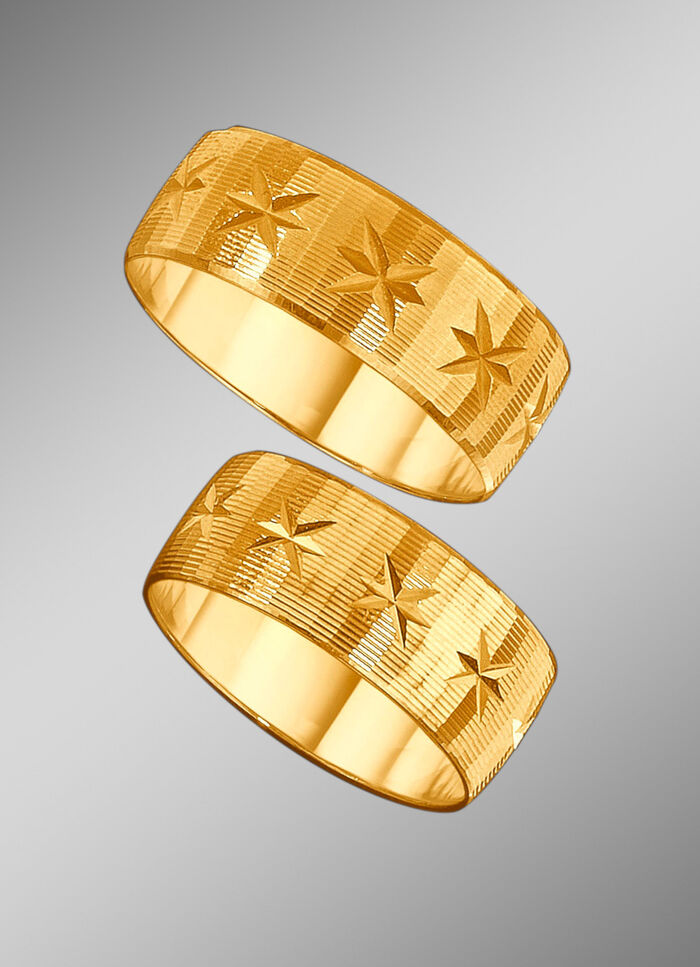 TraurinTrauring mit diamantierg mit diamantierten Rillen und kleinen Sternchen 