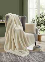 Webpelzdecke und Kissenbezug aus Alpakawolle NATUR