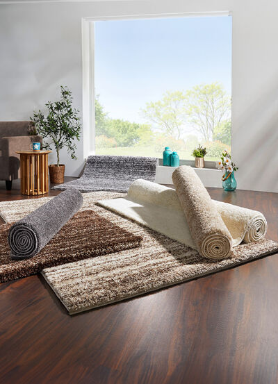 Handgetuftete Brücken und Teppiche mit dichtem Flor 