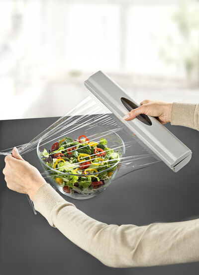 Folienspender mit Federmechanismus 