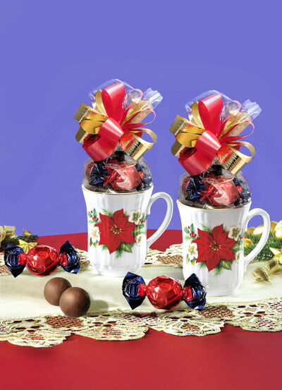 Porzellantassen mit Weihnachtstern-Dekor, 2er-Set 