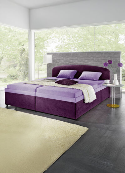 Polsterbett mit geräumigen Bettkasten 