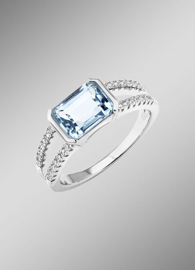 Eleganz trifft auf Zeitlosigkeit: Damenring mit Blautopas und synth. Zirkonia 