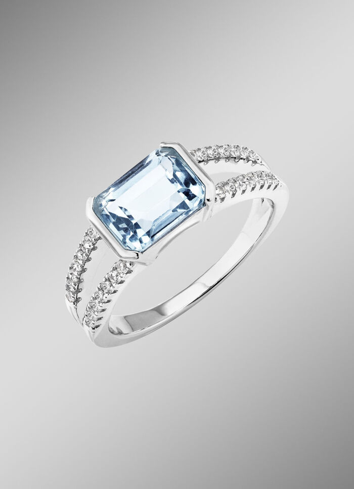 Eleganz trifft auf Zeitlosigkeit: Damenring mit Blautopas und synth. Zirkonia 