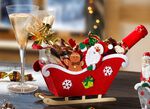Weihnachts-Schlitten mit Weihnachtsleckereien 