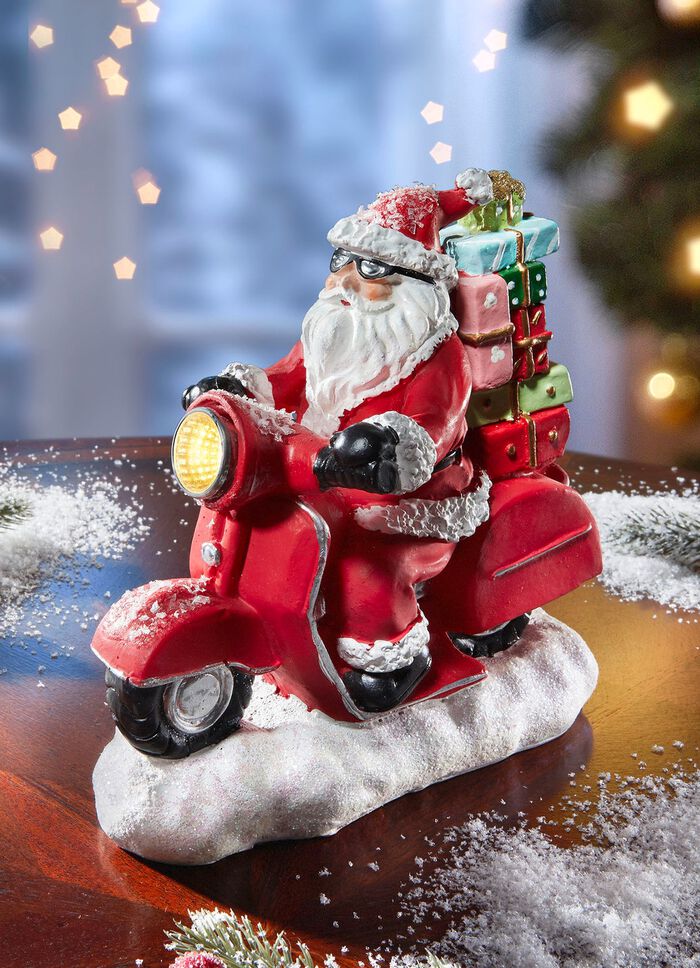 Beleuchteter Nikolaus auf Roller 